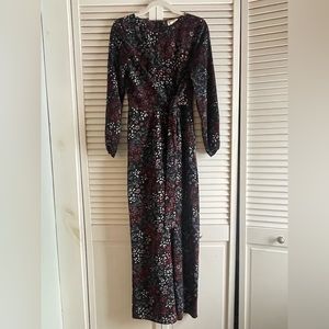 Black jumpsuit with floral pattern